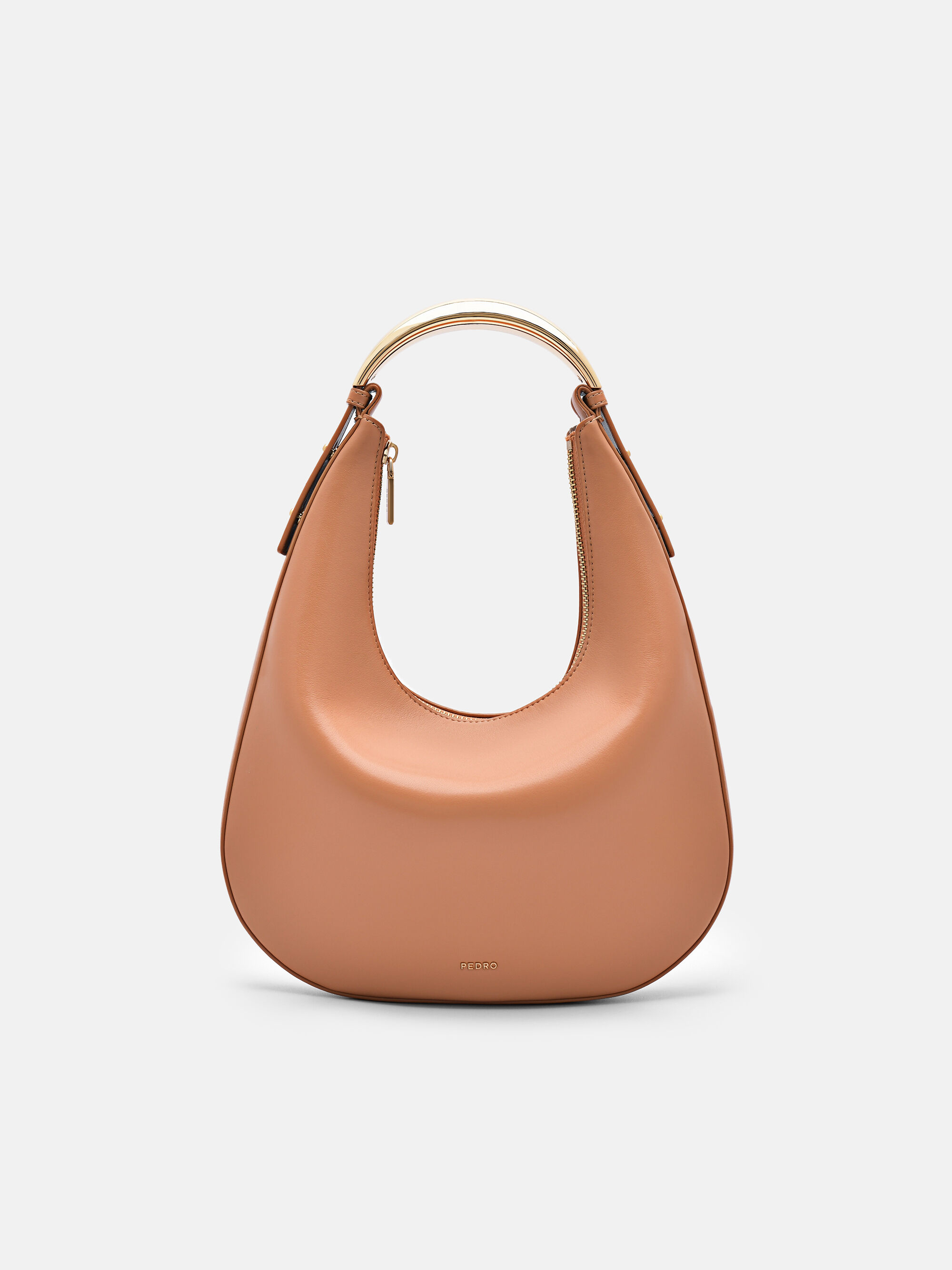 The psychology of carrying a designer bag | Elle Canada