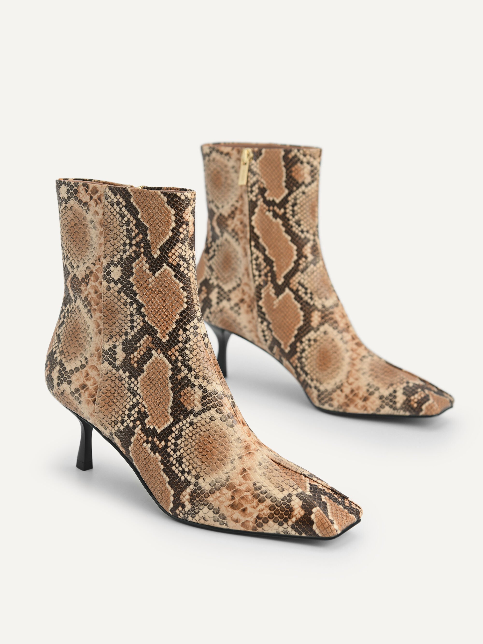 snake effect ankle boots